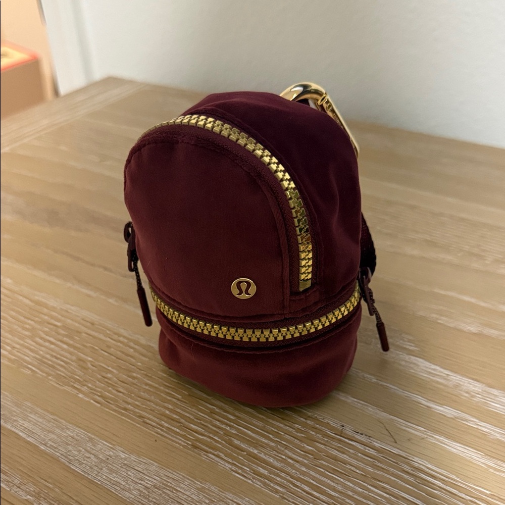 Lululemon Athletica Wine Red Mini Bag with Gold Zipper